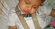 Indigo joined the competition — help win amazing prizes! toddler, sleeping, car_seat, pretzel, baby_bottle, white_shirt, puma, seatbelt, child, curly_hair, indoors, peaceful, nap, infant, straps, safe, cute, young_child, resting, food