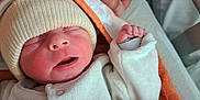 ézékiel participe au concours pour gagner de l'argent avec cette photo : baby, bed, blanket, clothing, cozy, cute, hand, hat, hospital, infant, newborn, person, portrait, resting, skin, sleeping, soft, towel, warm, wrapped