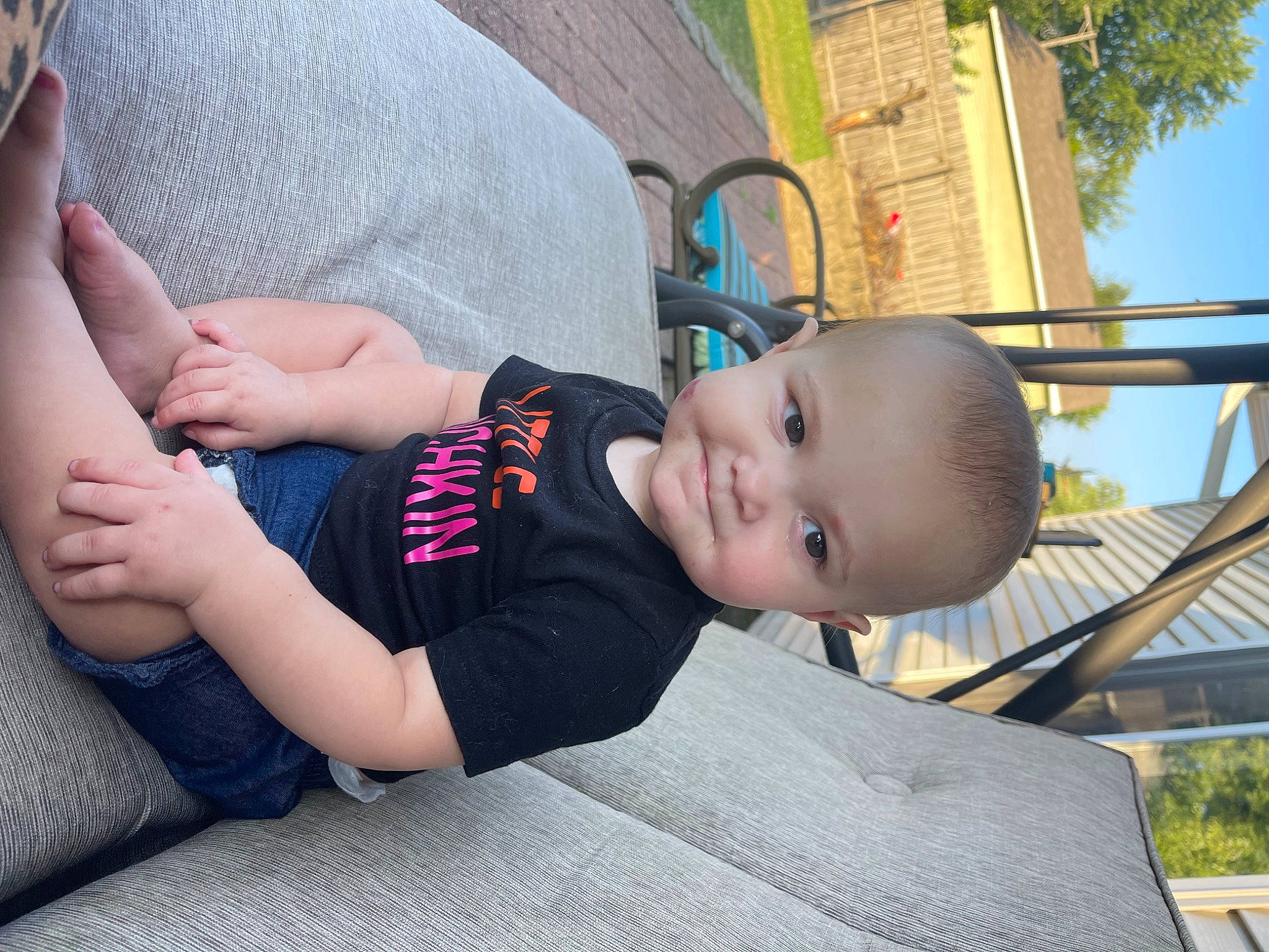 Ivey joined the competition — help win amazing prizes! abdomen, baby, child, city, elbow, eyewear, foot, fun, grass, human_leg, knee, leisure, person, plant, recreation, sitting, sky, thigh, toddler, tree
