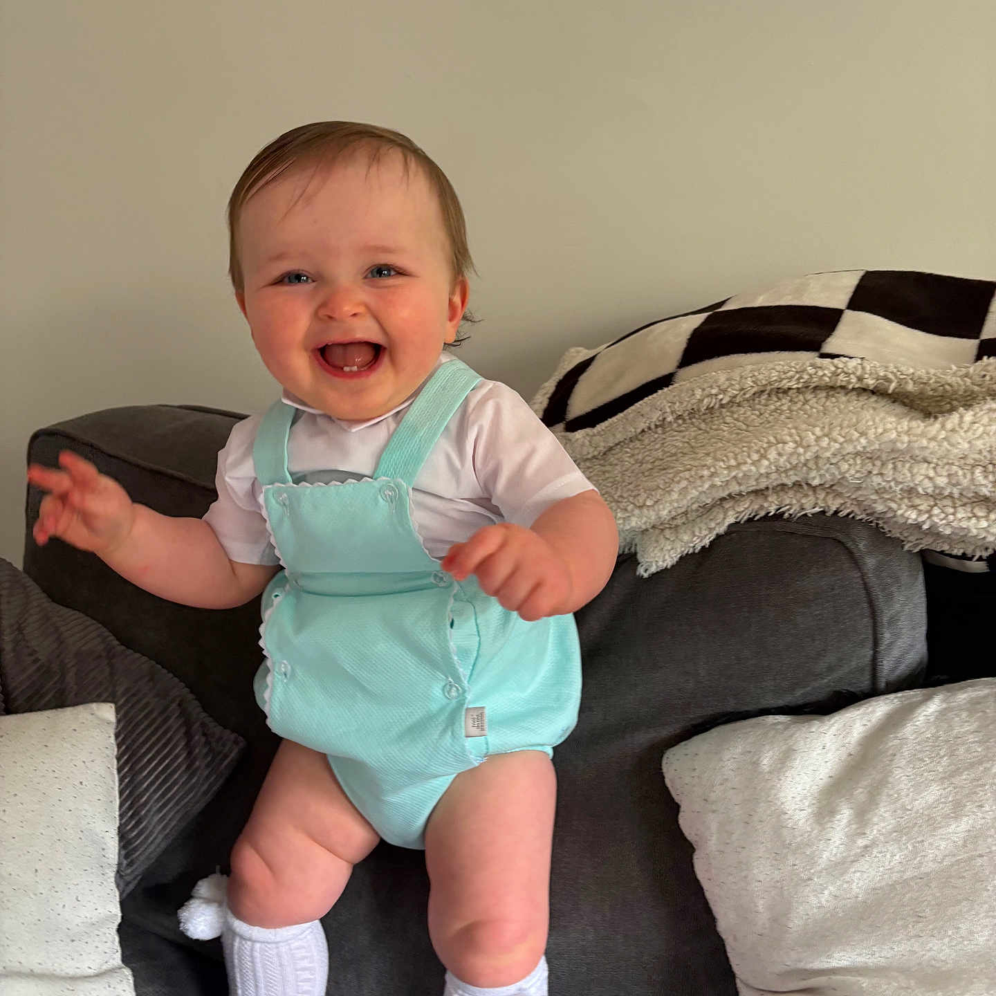 Luca joined the competition — help win amazing prizes! baby, babylaughing, bodypart, clothing, couch, cushion, face, finger, furniture, hand, happy, head, homedecor, hosiery, person, photography, portrait, sitting, smile, sock