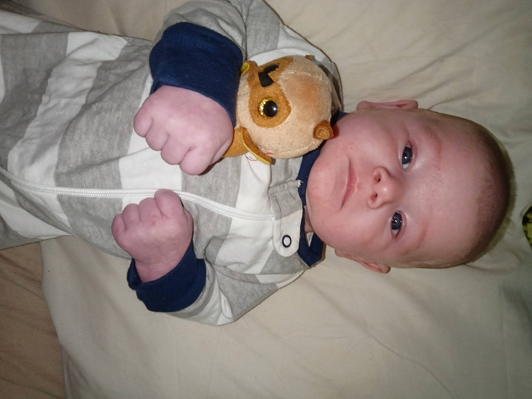 Leo is registered to the contest to win money with this photo: baby, baby_products, baby_toddler_clothing, bedtime, cheek, child, comfort, ear, gesture, iris, linens, mouth, nose, person, room, skin, sleep, sleeve, thumb, toddler