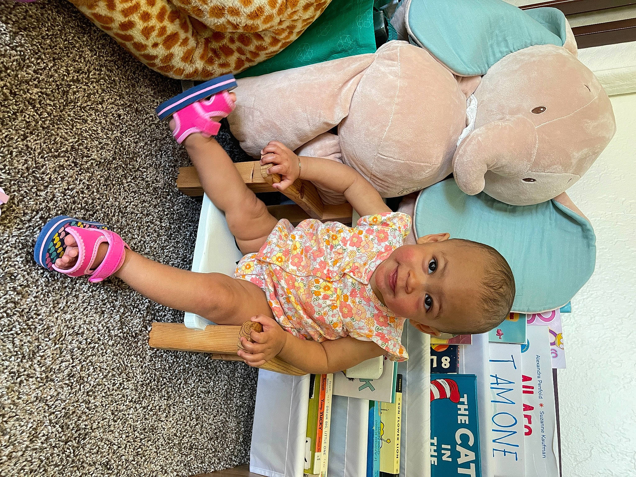 Maeve is registered to the contest to win money with this photo: baby, baby_sleeping, baby_toddler_clothing, child, comfort, finger, foot, fun, happy, human_body, human_leg, leg, leisure, pattern, person, pink, skin, smile, textile, thigh