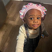Ariel joined the competition — help win amazing prizes! bonnet, cap, clothing, crawling, door, face, footwear, happy, hardwood, hat, head, person, photography, plywood, portrait, shoe, sitting, smile, sunhat, wood