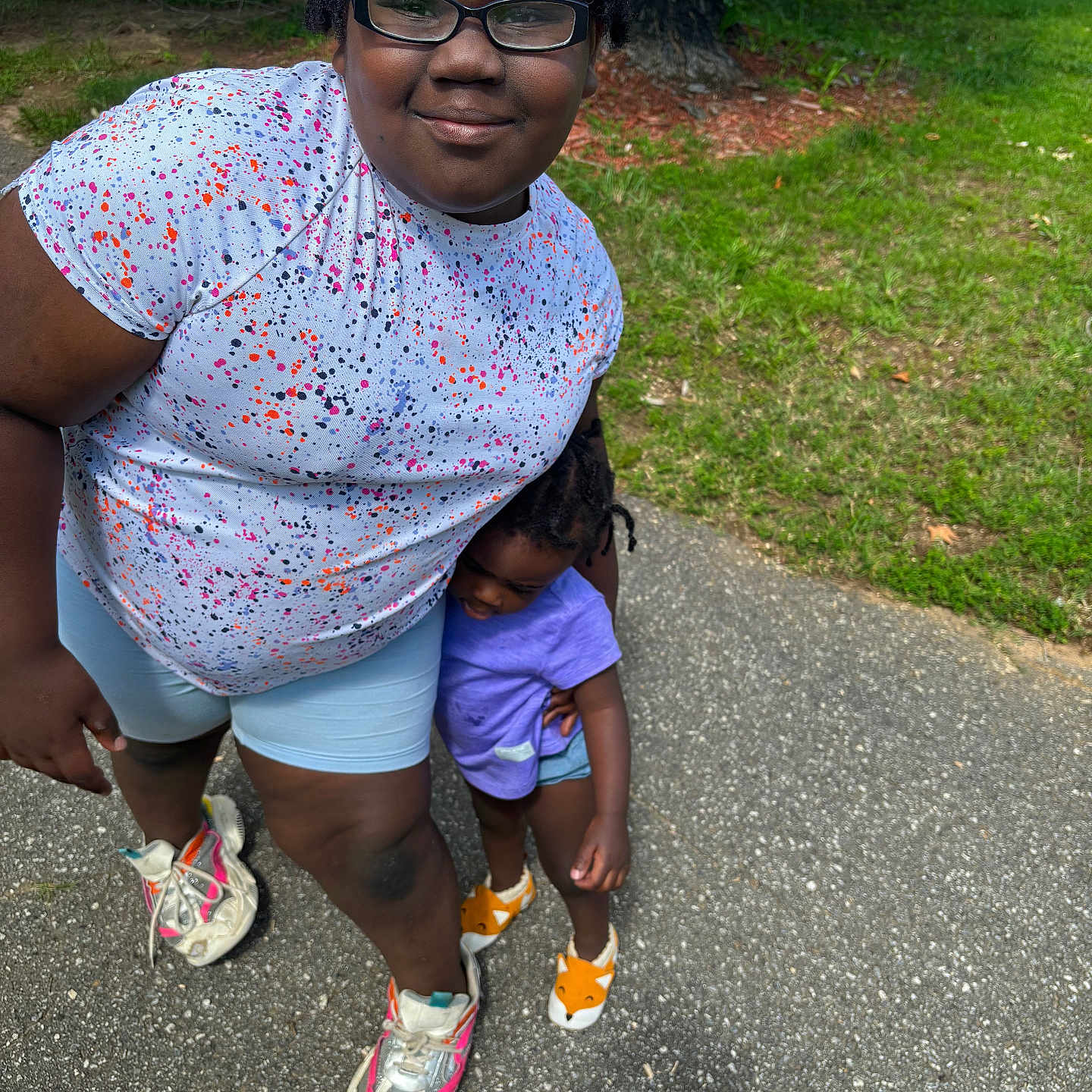 Ashley joined the competition — help win amazing prizes! accessories, adult, clothing, face, female, footwear, glasses, grass, head, person, photography, plant, portrait, road, runningshoe, shoe, shorts, sneaker, walking, woman