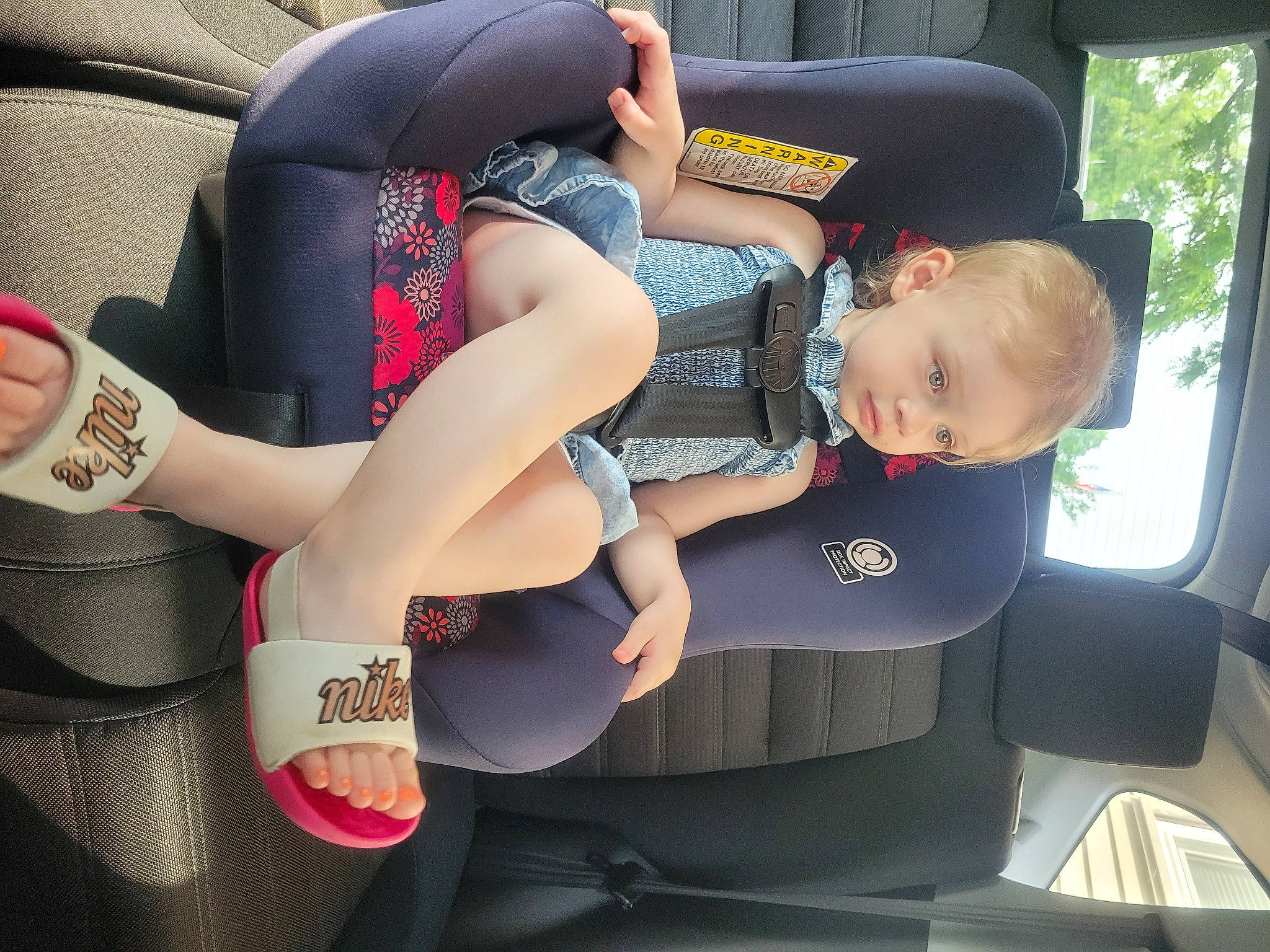 Fiona joined the competition — help win amazing prizes! auto_part, automotive_design, car_seat, car_seat_cover, carmine, comfort, elbow, family_car, fun, human_leg, knee, lap, motor_vehicle, person, shorts, sitting, sportswear, thigh, toddler, vehicle