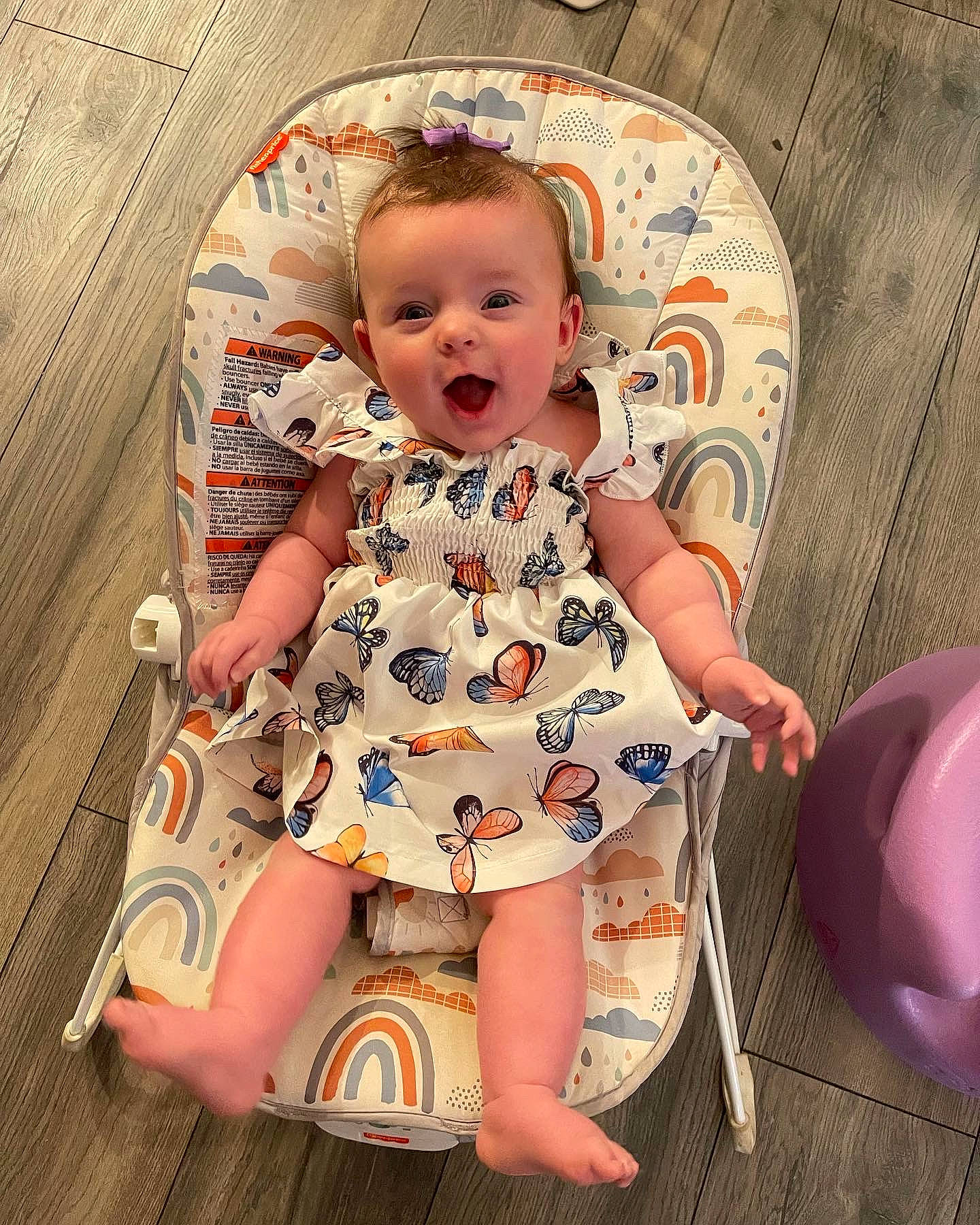 Kambri is registered to the contest to win money with this photo: baby, baby_carriage, baby_products, baby_toddler_clothing, baby_toys, chair, cheek, child, dress, fun, happy, pattern, person, pink, play, product, sitting, skin, sleeve, smile