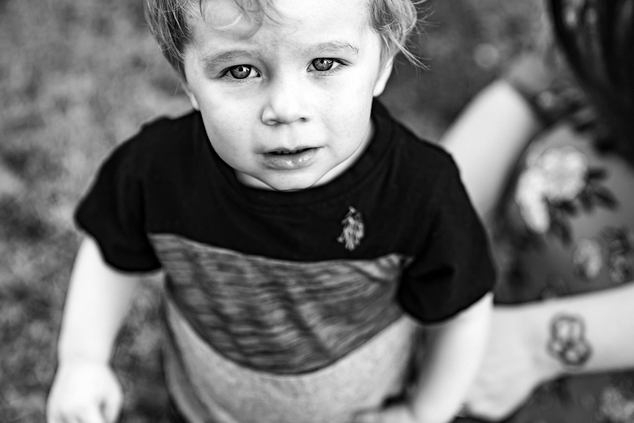 Kaleb is registered to the contest to win money with this photo: black, black_and_white, cheek, child, eye, face, facial_expression, fun, head, monochrome, monochrome_photography, organ, people, person, photograph, photography, skin, smile, snapshot, toddler