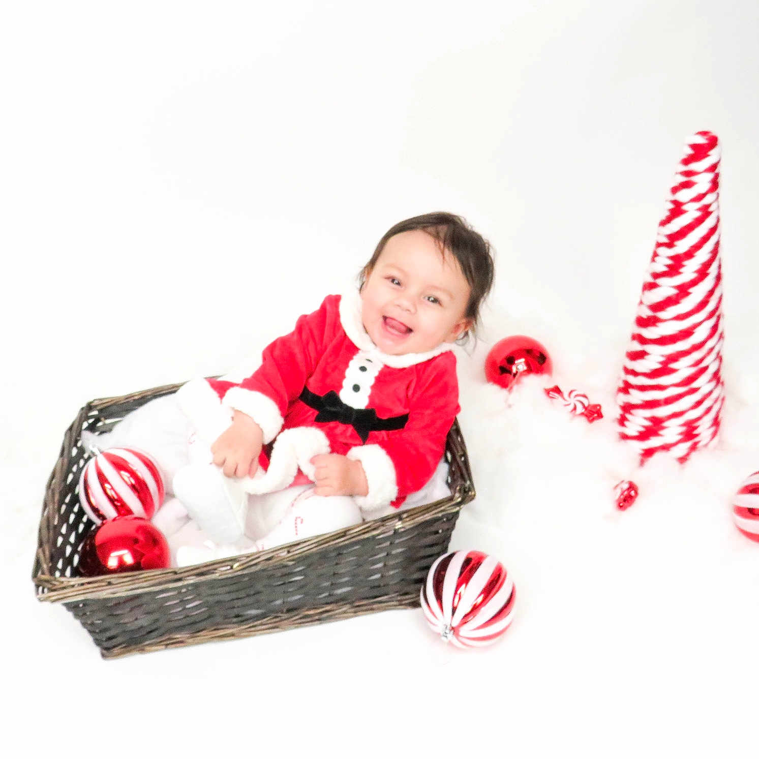Isla-Rose joined the competition — help win amazing prizes! baby, basket, bed, bodypart, clothing, costume, face, food, furniture, glove, happy, hat, head, laughing, newborn, person, photography, portrait, smile, sweets