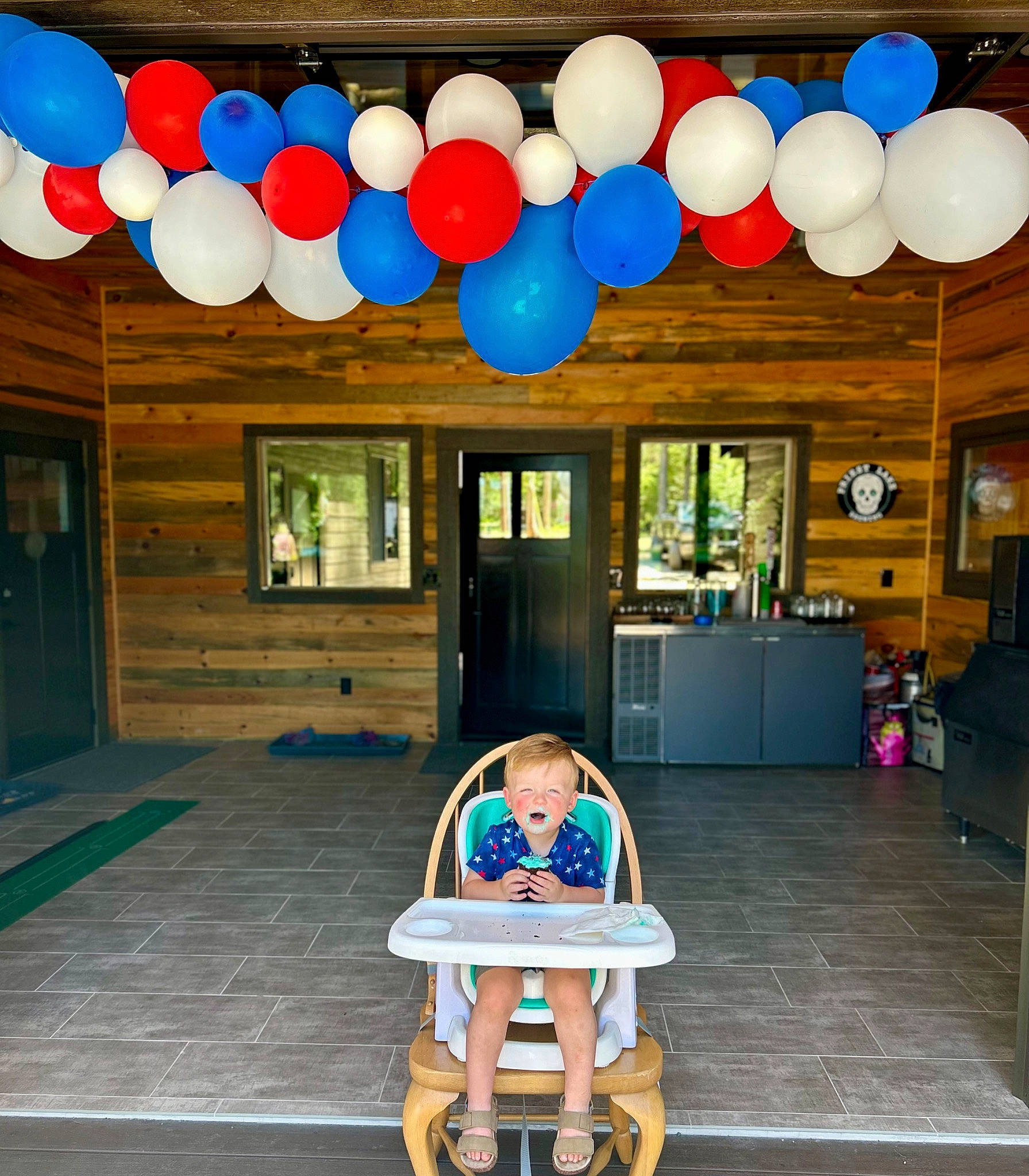Finley Edward is registered to the contest to win money with this photo: azure, baby, balloon, beauty, bench, blue, door, electric_blue, event, fun, happy, leisure, organ, party_supply, person, photograph, shorts, snapshot, toddler, window