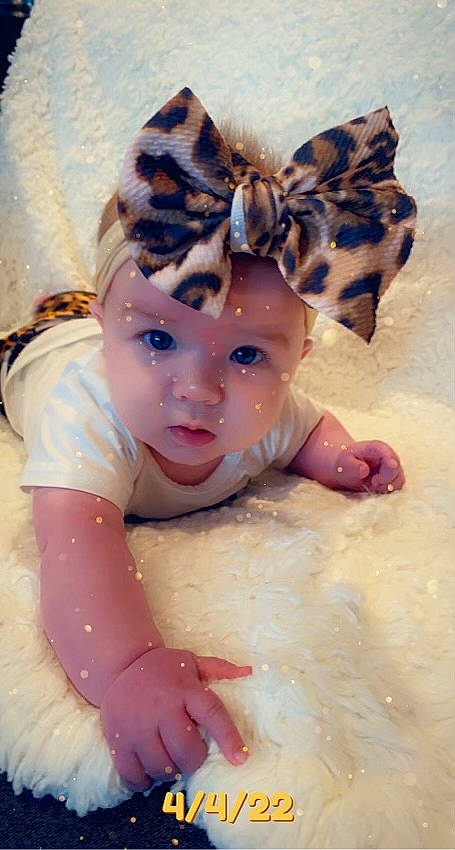 Oaklyn joined the competition — help win amazing prizes! arm, bathing, cap, child, fashion_accessory, fawn, finger, fun, hair_accessory, happy, hat, headpiece, headwear, pattern, person, pink, play, recreation, sand, skin