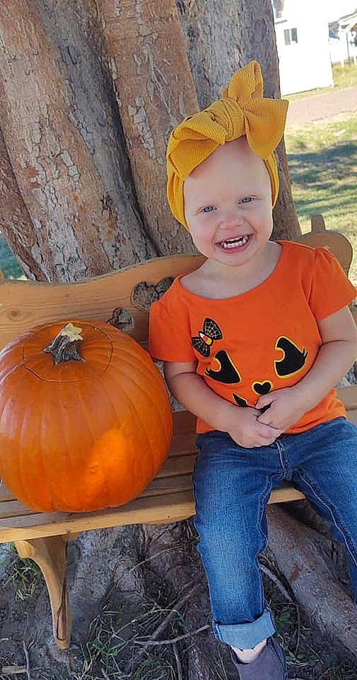 Braelyn joined the competition — help win amazing prizes! baby_toddler_clothing, calabaza, clothing, cucurbita, gourd, happy, head, headwear, jeans, joy, leaf, leg, orange, organ, person, photograph, plant, pumpkin, smile, toddler