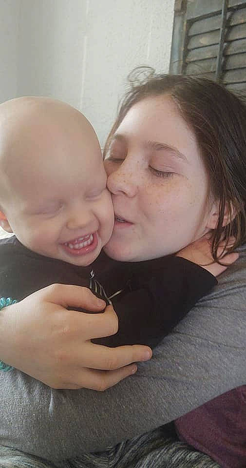 Braelyn joined the competition — help win amazing prizes! baby, cheek, cheek_kissing, ear, eyebrow, eyelash, finger, forehead, gesture, hair, hand, happy, iris, kiss, lip, mouth, neck, nose, person, skin