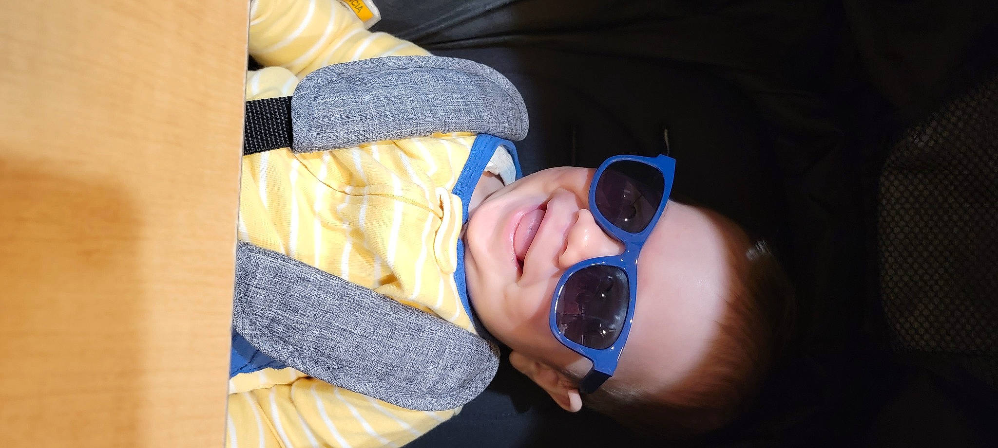 Jareth is registered to the contest to win money with this photo: audio_equipment, baby, comfort, electric_blue, eyewear, fashion_accessory, finger, flash_photography, fun, gesture, glasses, goggles, hand, joy, nail, person, personal_protective_equipment, sunglasses, thumb, toddler