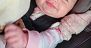 Addilynn joined the competition — help win amazing prizes! baby, blanket, car_seat, child, clothing, comfort, cute, expression, face, head, indoor, infant, person, rest, safety, seat_belt, smile, soft_texture, warm, young