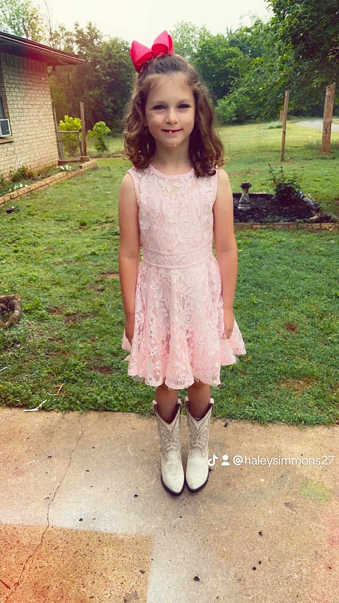 Gracie is registered to the contest to win money with this photo: backyard, child, clothing, dress, face, female, footwear, girl, grass, head, nature, outdoors, park, person, photography, plant, portrait, shoe, standing, yard