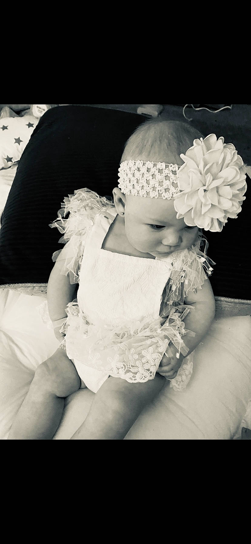 Akira is registered to the contest to win money with this photo: arm, baby, baby_toddler_clothing, beauty, bridal_accessory, dress, flash_photography, hairstyle, hand, happy, headband, headgear, headpiece, headwear, jewellery, monochrome_photography, person, petal, shoulder, style