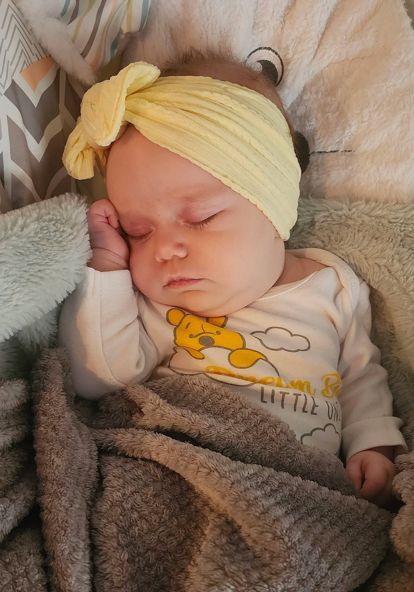 Baileigh joined the competition — help win amazing prizes! baby, baby_products, baby_sleeping, baby_toddler_clothing, cap, cheek, child, comfort, facial_expression, fur, headwear, iris, knit_cap, linens, person, product, sitting, skin, sleeve, textile