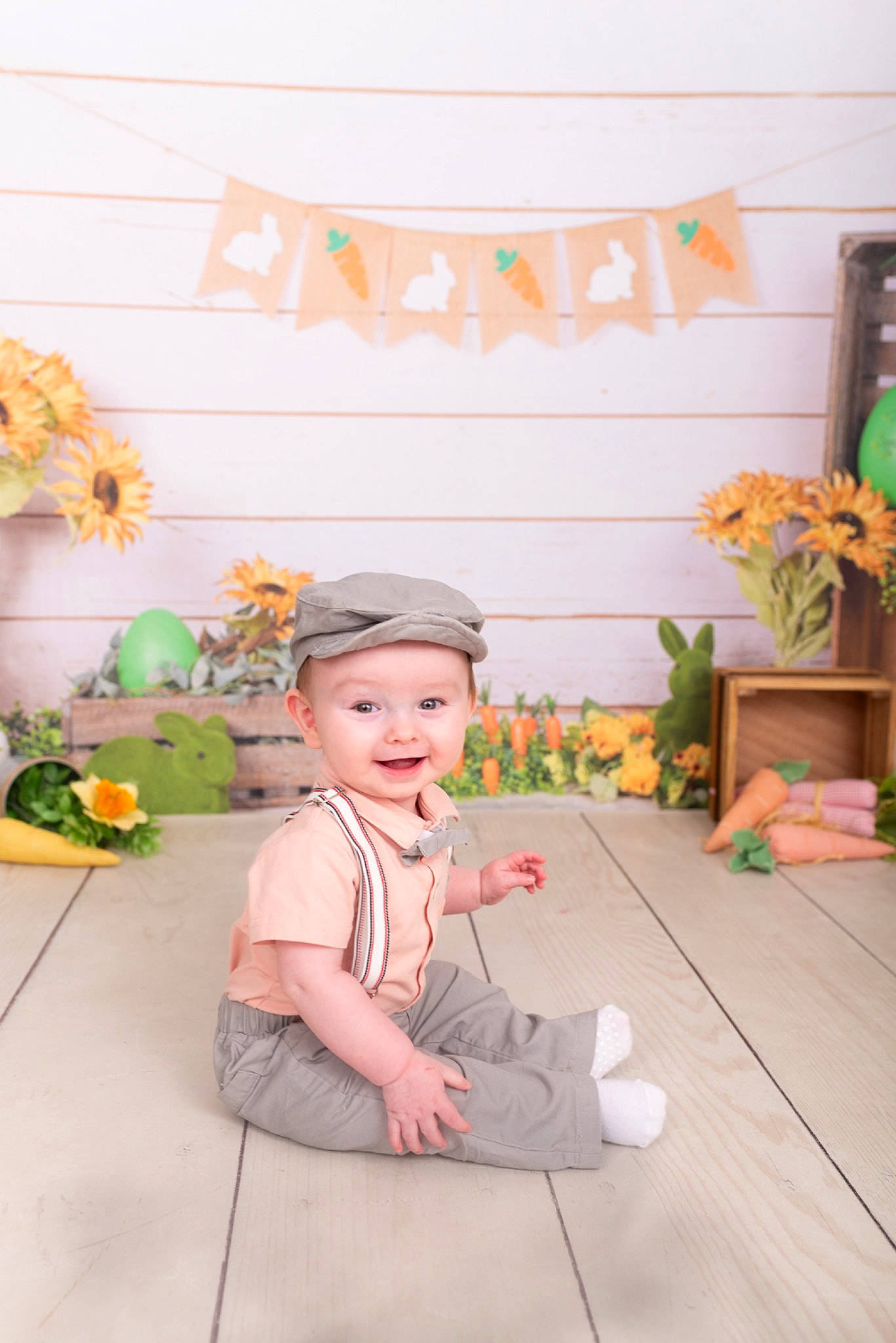 Colson is registered to the contest to win money with this photo: art, baby, child, fashion_accessory, floor, flooring, font, fun, happy, hat, headwear, joy, leisure, orange, peach, person, plant, play, room, sitting