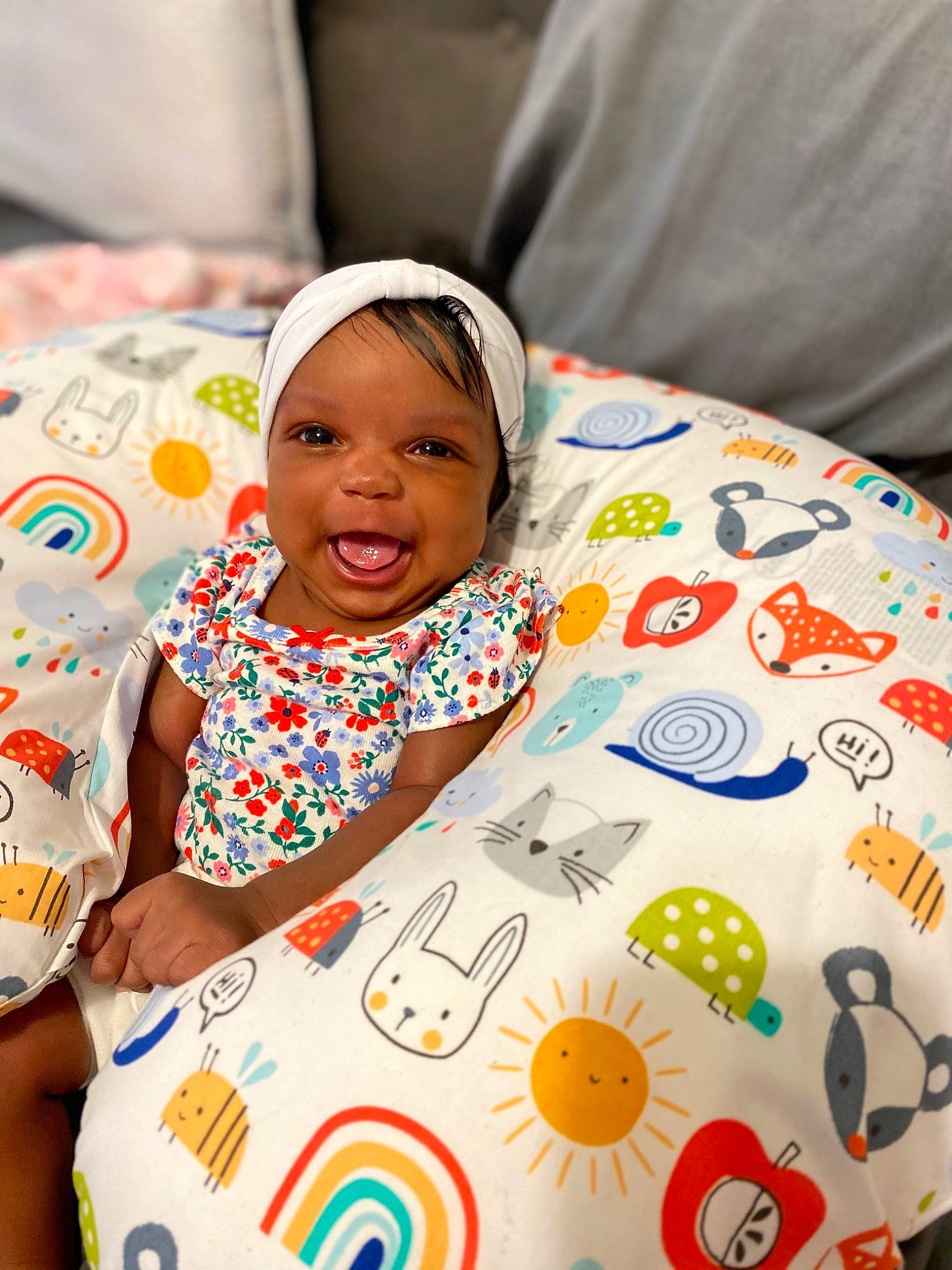 Hazel joined the competition — help win amazing prizes! baby, baby_toddler_clothing, bedding, child, comfort, event, facial_expression, fun, happy, human, linens, pattern, people, person, product, room, smile, t_shirt, toddler, white