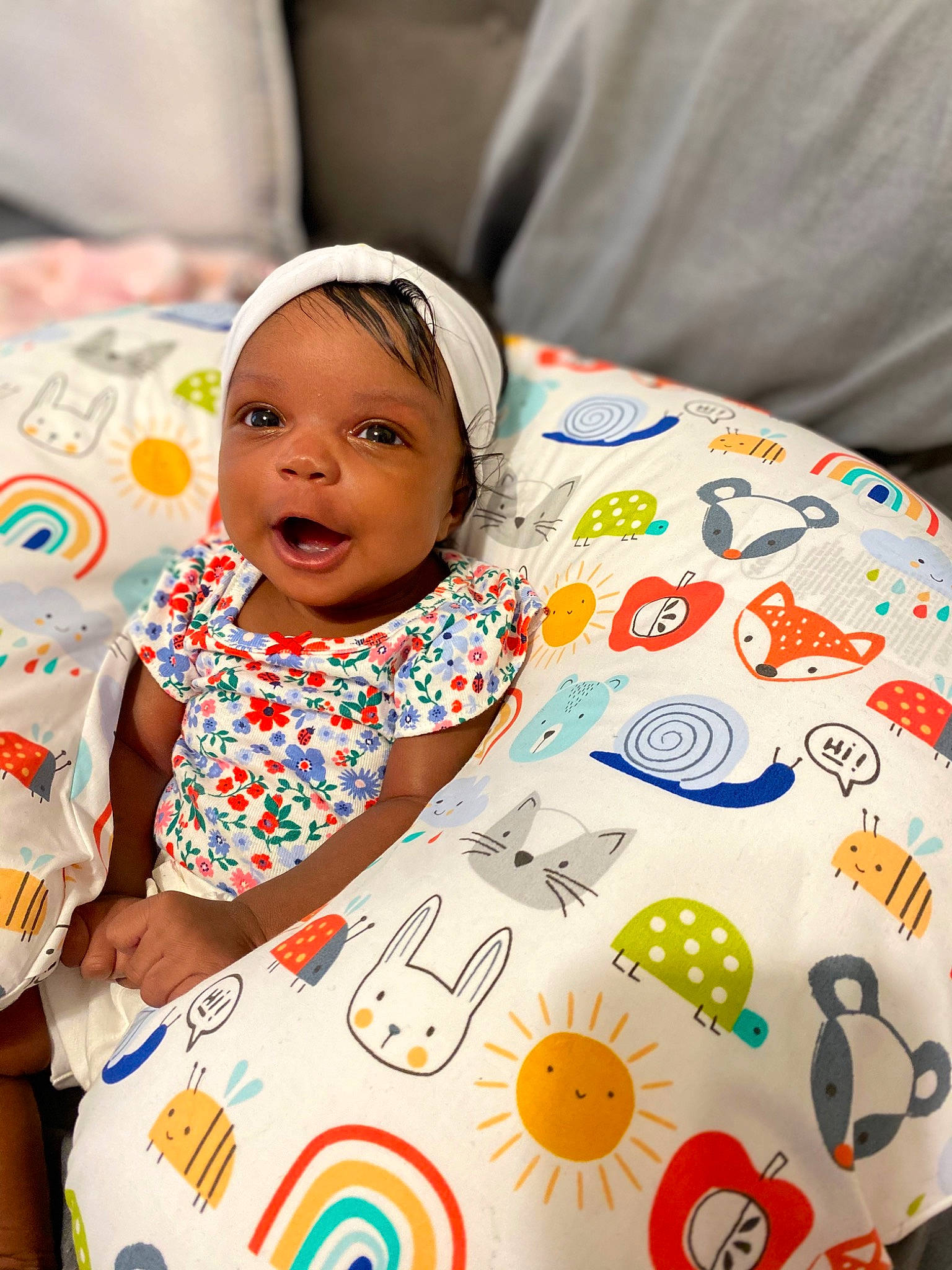 Hazel is registered to the contest to win money with this photo: art, baby, baby_products, baby_toddler_clothing, bedding, child, comfort, event, facial_expression, fun, happy, illustration, leisure, linens, pattern, person, play, skin, t_shirt, toddler