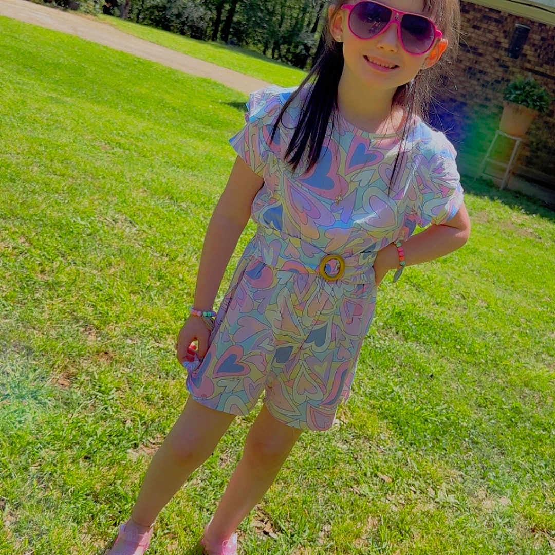 Michaela joined the competition — help win amazing prizes! accessories, backyard, child, clothing, dress, face, grass, head, lawn, nature, outdoors, park, person, photography, plant, portrait, summer, sunglasses, tree, yard
