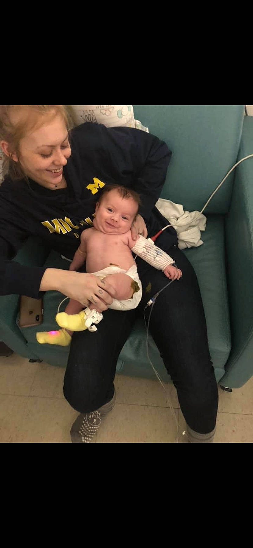 Ayden is registered to the contest to win money with this photo: arm, baby, child, fun, leg, person, sitting, smile, toddler