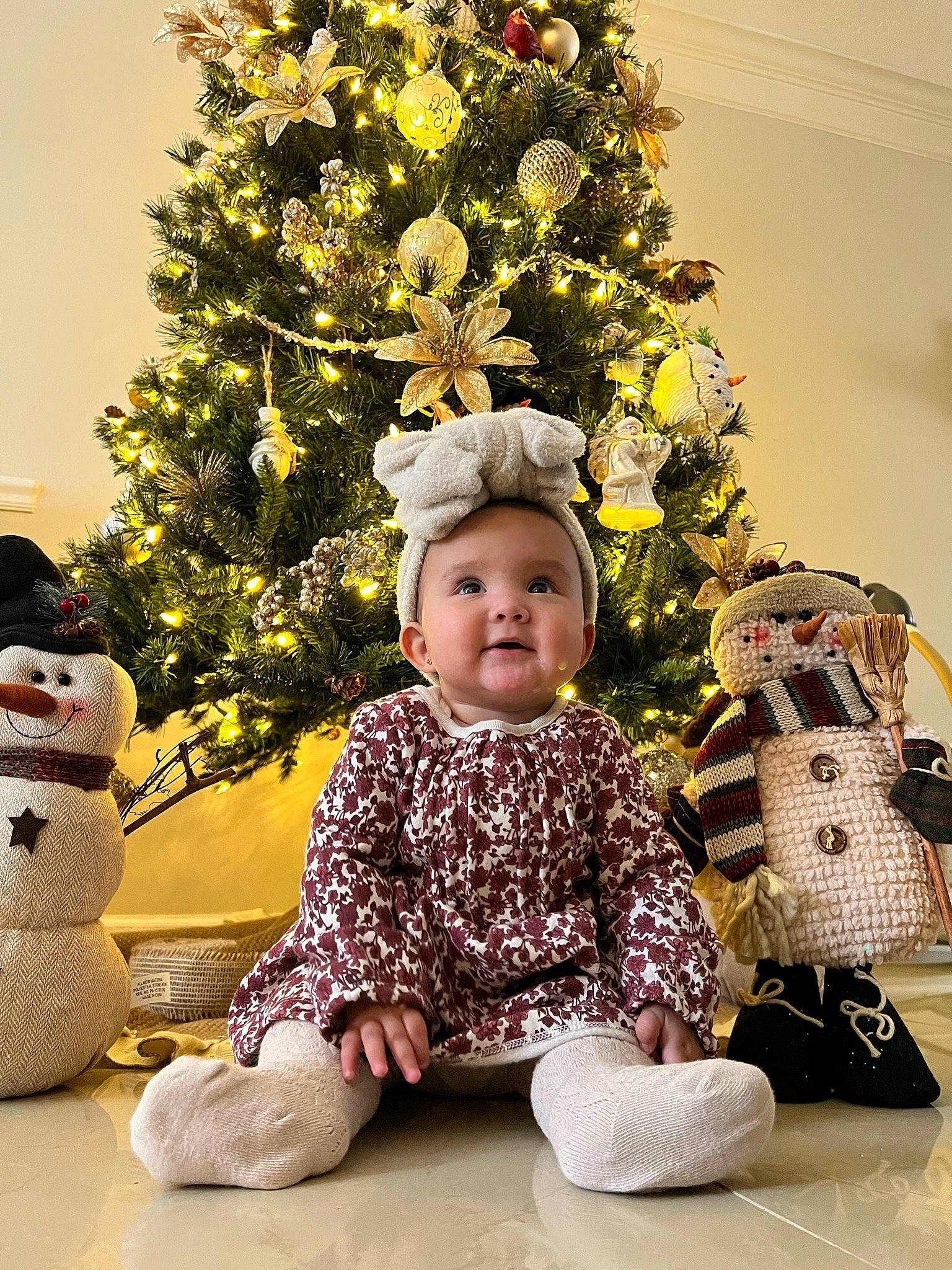 Ivy joined the competition — help win amazing prizes! baby, baby_toddler_clothing, child, christmas, christmas_decoration, christmas_eve, christmas_ornament, christmas_tree, event, evergreen, happy, hat, headgear, holiday, holiday_ornament, ornament, person, plant, sitting, toddler