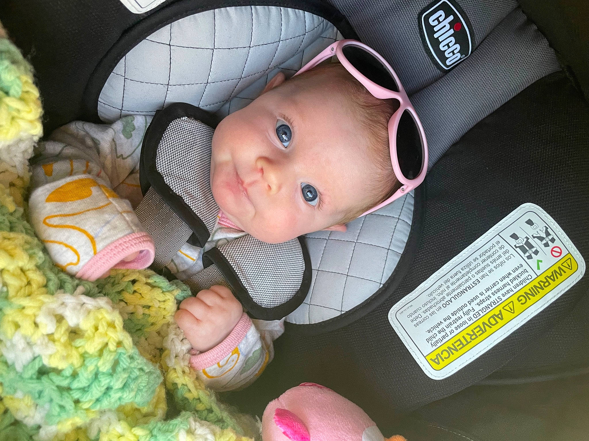 Isobel is registered to the contest to win money with this photo: baby, baby_carriage, baby_products, baby_toddler_clothing, car_seat, cheek, child, comfort, eye, fashion_accessory, finger, fun, hat, head, iris, person, pink, sitting, skin, smile