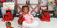 Averiana is registered to the contest to win money with this photo: toddler, birthday_cake, pink_cake, red_outfit, strawberries, red_roses, wooden_door, birthday, celebration, flower_decor, cake_stand, white_floor, child, portrait, indoors, decorative, cute, festive, girl, party