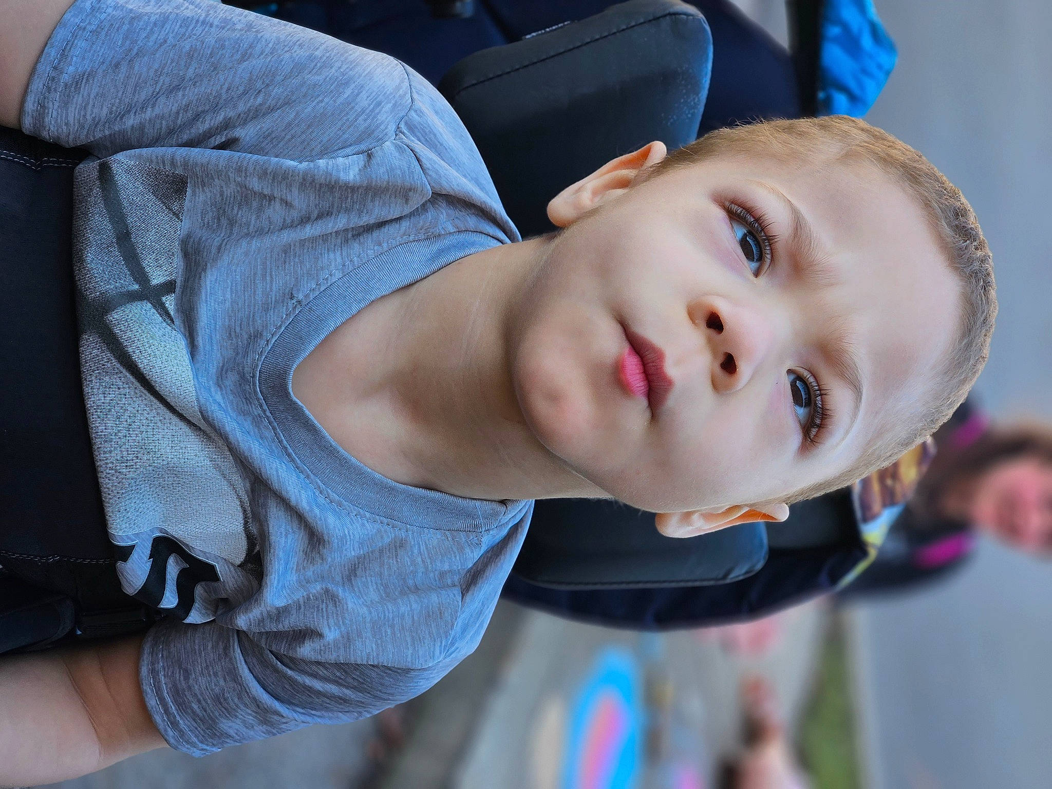 Isaiah is registered to the contest to win money with this photo: auto_part, blue, cheek, child, comfort, denim, electric_blue, flash_photography, fun, happy, leisure, lip, nose, person, portrait_photography, sitting, sleeve, toddler, vacation