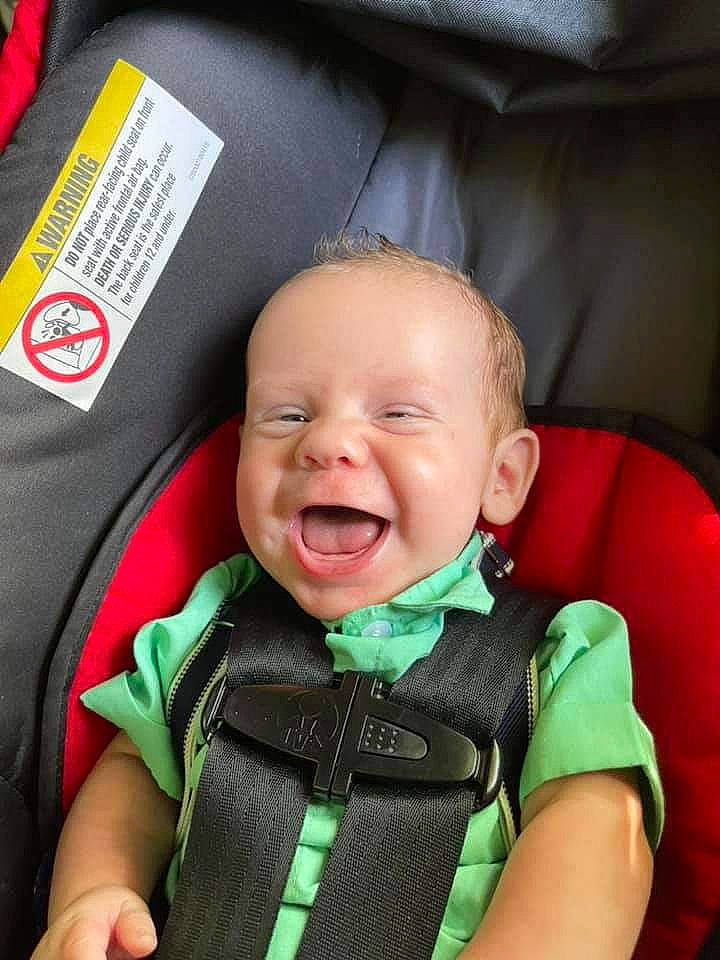 Raylan joined the competition — help win amazing prizes! baby, baby_carriage, baby_in_car_seat, baby_toddler_clothing, cheek, comfort, eyebrow, happy, lifejacket, mouth, nose, person, product, seat_belt, skin, sleeve, smile, textile, toddler, tooth