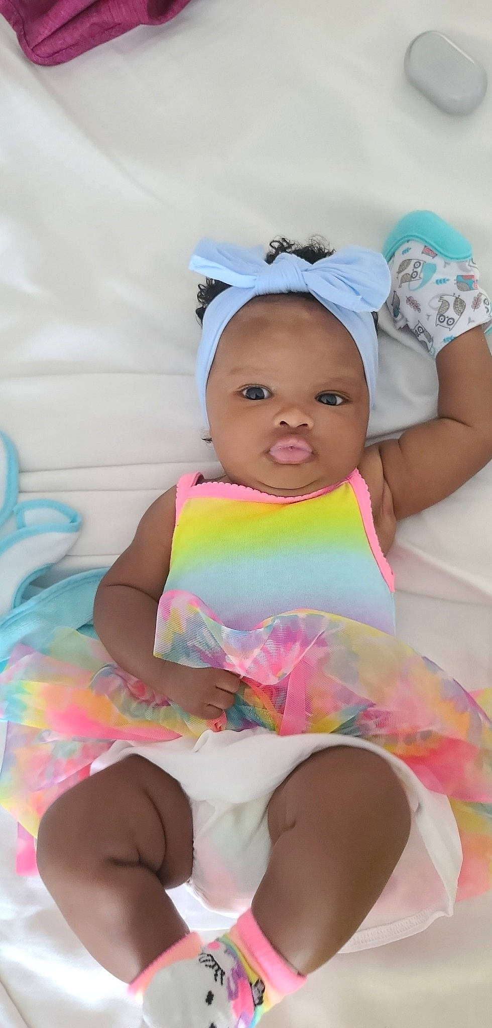 Ensleigh joined the competition — help win amazing prizes! baby, baby_products, baby_toddler_clothing, child, comfort, event, fun, happy, human_leg, leisure, magenta, pattern, person, pink, product, purple, sitting, skin, thigh, toddler