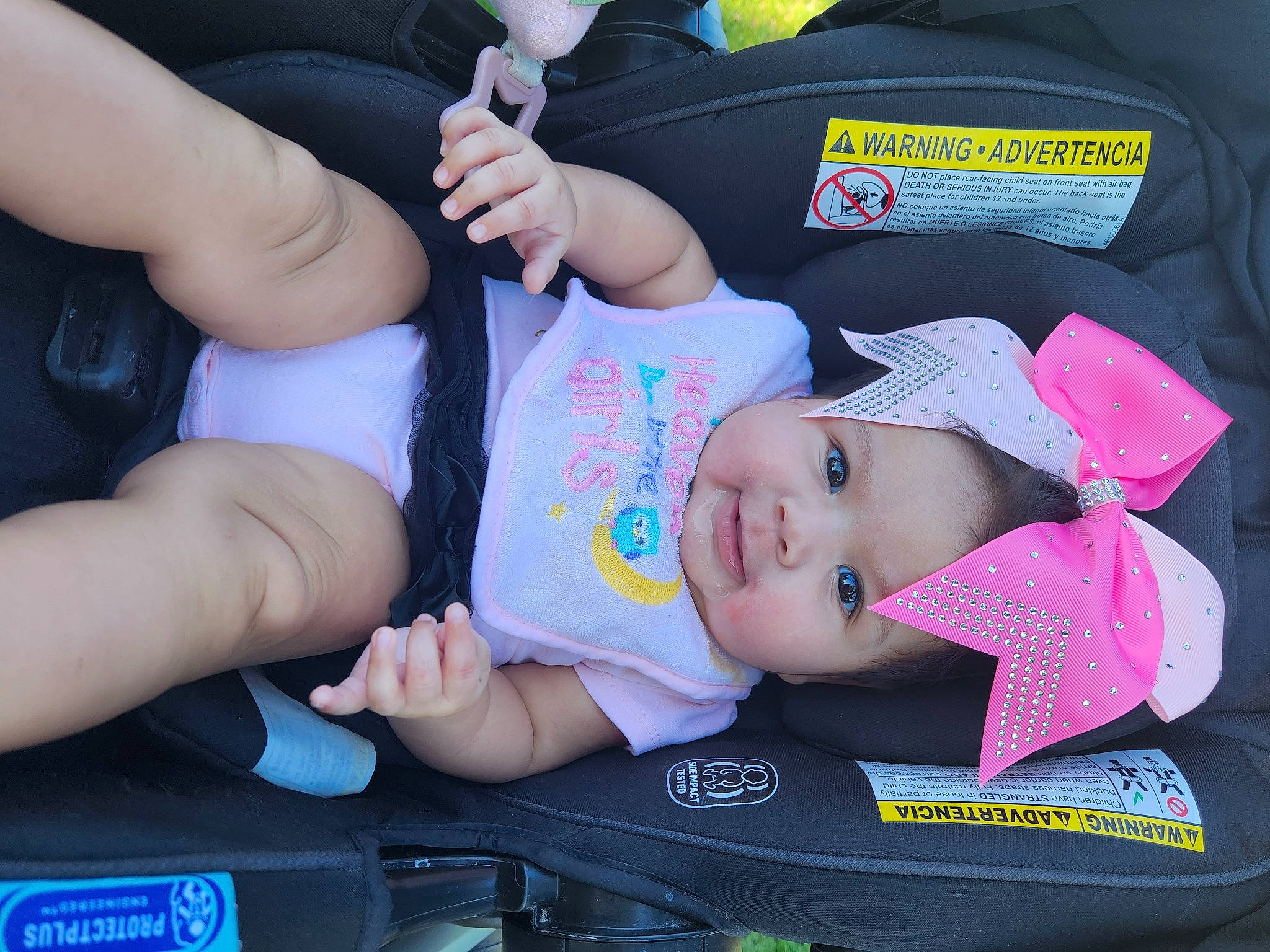 Joselyn joined the competition — help win amazing prizes! baby, baby_carriage, baby_in_car_seat, baby_products, baby_toddler_clothing, car_seat, cheek, child, comfort, gesture, hand, headwear, human_leg, knee, lap, nail, person, seat_belt, sitting, thigh