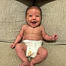 Adeline joined the competition — help win amazing prizes! baby, infant, smiling, diaper, sitting, couch, scar, skin, happy, child, human, face, arms, legs, furniture, indoors, cute, young, expression, health