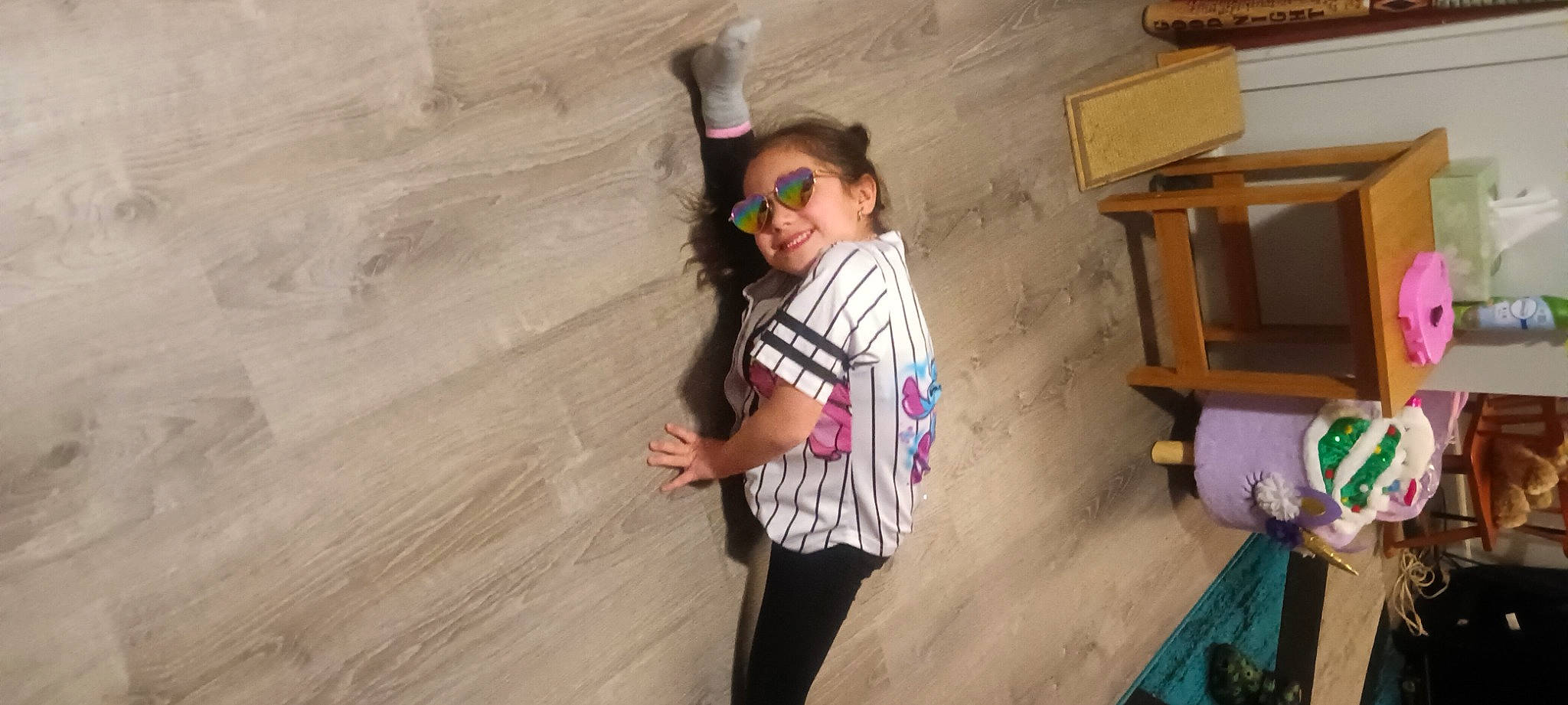 Aliyah joined the competition — help win amazing prizes! adventure, child, climbing, event, eyewear, floor, flooring, fun, gesture, happy, hardwood, joy, leisure, performing_arts, person, recreation, smile, sunglasses, t_shirt, thigh