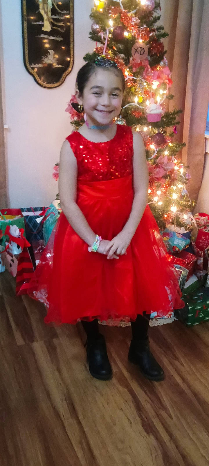 Aliyah joined the competition — help win amazing prizes! child, christmas_tree, costume, dress, event, fashion_accessory, fashion_design, flooring, formal_wear, fun, happy, headpiece, holiday, human_leg, jewellery, joy, magenta, necklace, person, pink