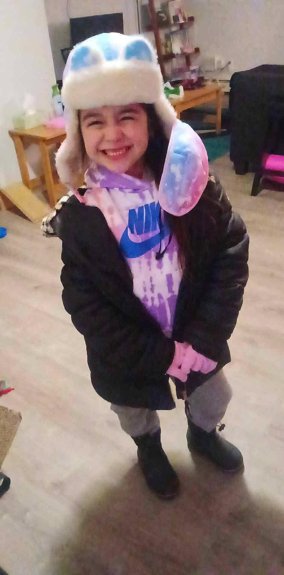 Aliyah joined the competition — help win amazing prizes! child, electric_blue, event, fashion_accessory, flooring, fun, fur, happy, headwear, joy, leisure, magenta, person, pink, purple, recreation, room, sleeve, smile, sock