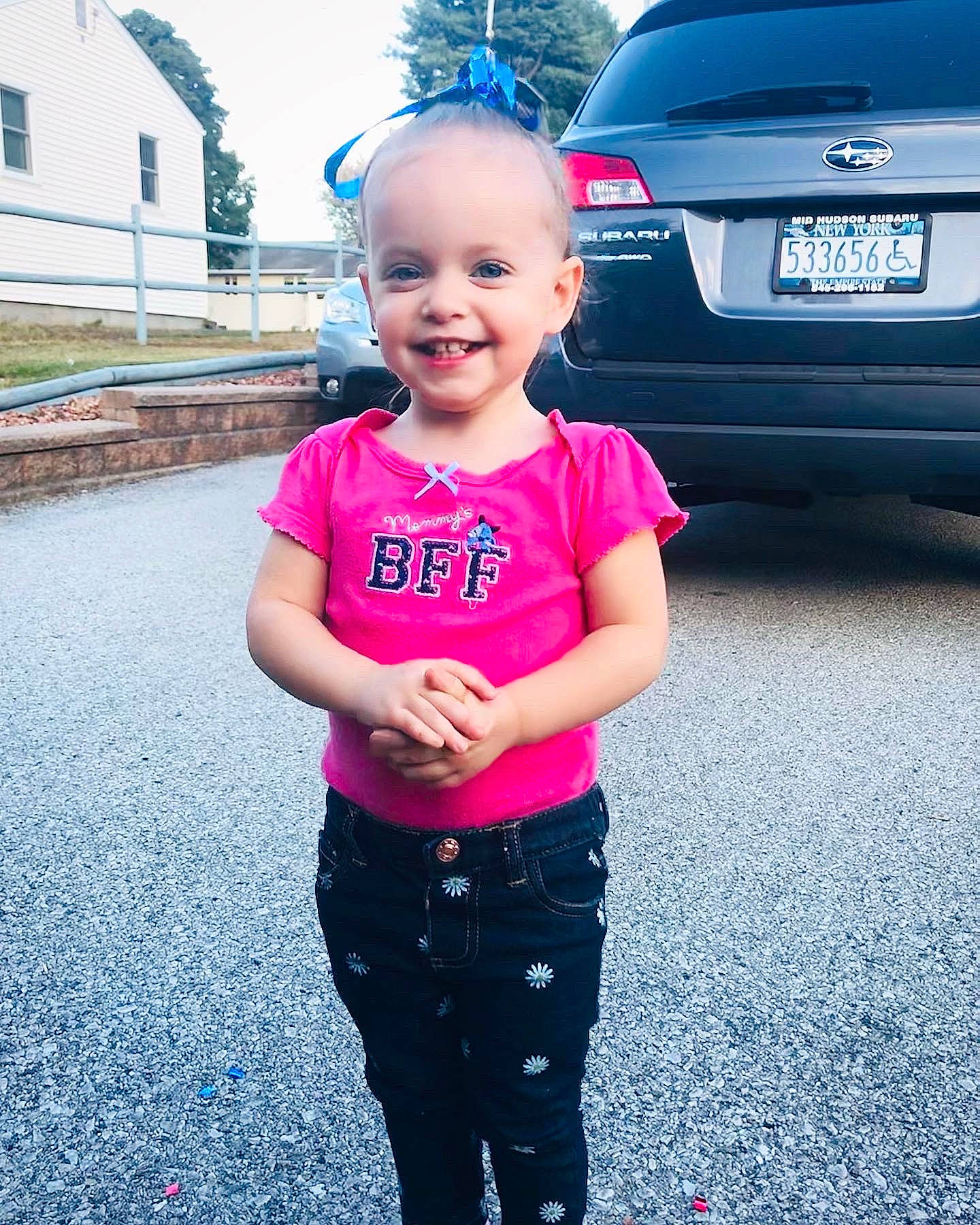 Chelsea is registered to the contest to win money with this photo: asphalt, car, child, city_car, cool, family_car, joy, luxury_vehicle, people, person, photography, pink, plant, recreation, standing, subcompact_car, summer, t_shirt, toddler, vacation