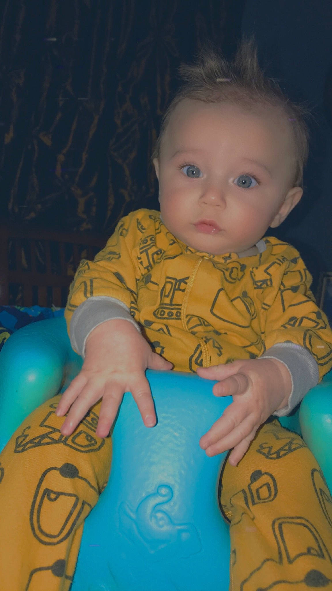 Ashton is registered to the contest to win money with this photo: baby, baby_products, baby_toys, cheek, child, eye, face, finger, fun, head, iris, leisure, mouth, person, play, product, sitting, skin, smile, toddler