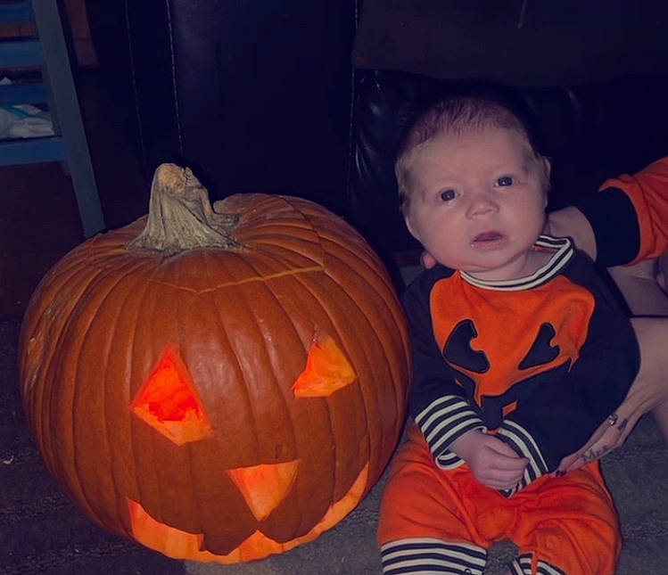 Braxton Hurley is registered to the contest to win money with this photo: art, baby_toddler_clothing, black, calabaza, creative_arts, cucurbita, gourd, happy, iris, jack_o_lantern, leaf, natural_foods, orange, person, plant, pumpkin, squash, tints_and_shades, vegetable, winter_squash