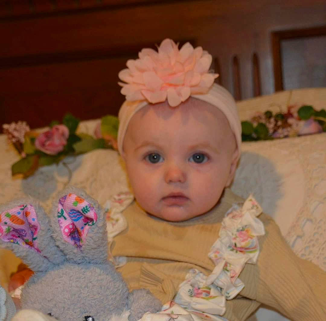 Irene is registered to the contest to win money with this photo: baby, baby_sleeping, baby_toddler_clothing, cheek, child, comfort, eye, face, fashion_accessory, head, headband, headgear, headpiece, iris, linens, person, petal, pink, skin, textile