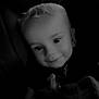 Alexys participe au concours pour gagner de l'argent avec cette photo : baby, baby_blanket, black_and_white, blanket, car, car_seat, child, cozy, curly_hair, cute, face, happy, indoors, infant, person, portrait, seat, smile, toddler, young_child