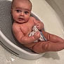 Amias joined the competition — help win amazing prizes! baby, bathtub, bath, child, naked, washcloth, water, skin, seat, bathroom, infant, cute, sitting, wet, young, expression, holding, indoors, person, tub
