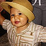 toddler, child, hat, straw_hat, striped_shirt, smiling, indoor, person, happy, cute, face, eyes, cheeks, hands, clothing, buttoned_shirt, portrait, baby, family, warm_lighting