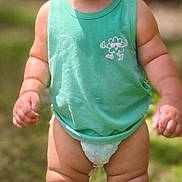 Raylan is registered to the contest to win money with this photo: toddler, child, baby, standing, outdoor, grass, green_shirt, diaper, sunlight, happy, cute, smiling, barefoot, summer, nature, portrait, young_child, chubby, skin, daylight