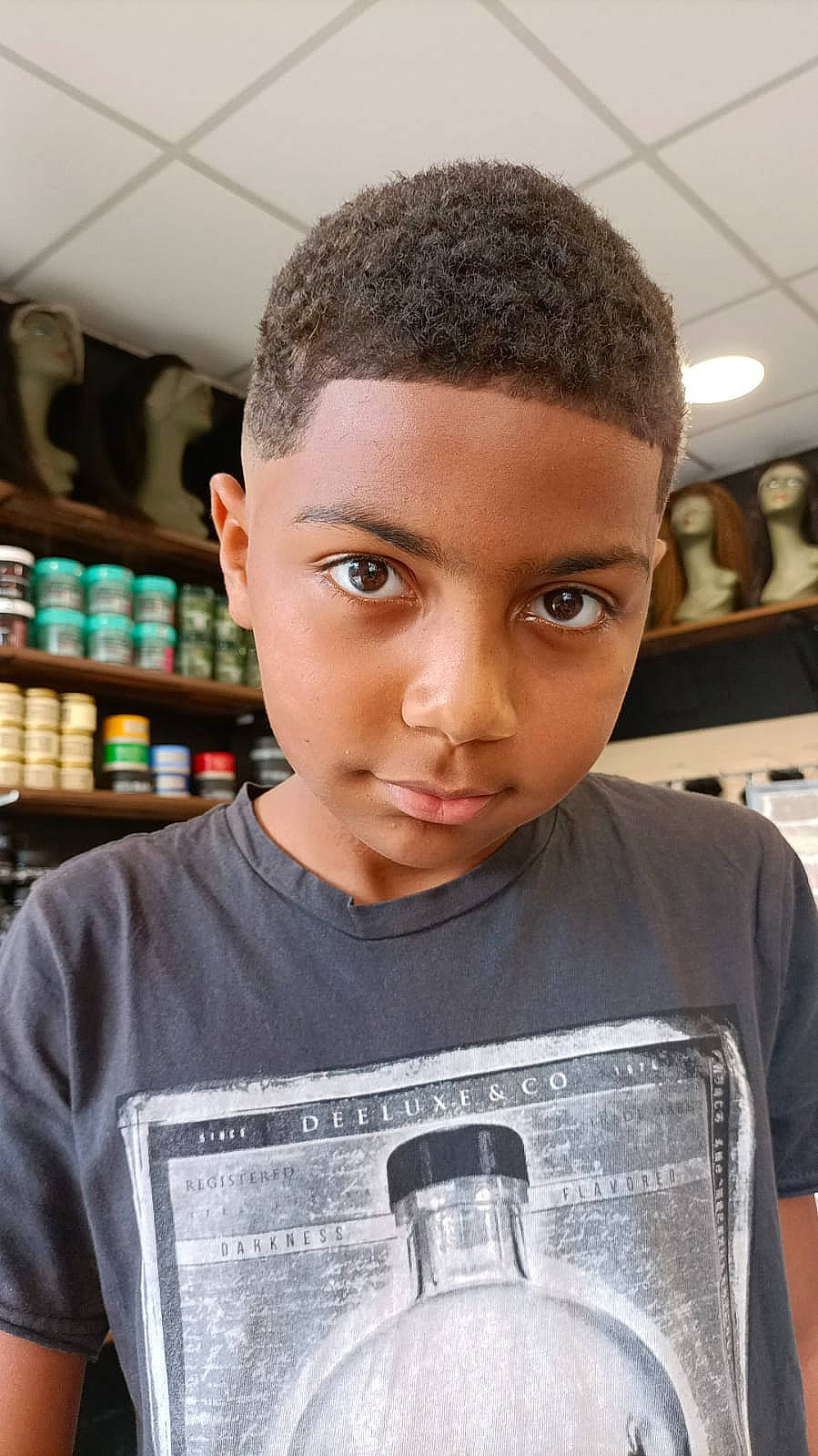 Daniel a rejoint le concours — aidez-le/la à gagner de superbes lots ! active_shirt, black, black_hair, buzz_cut, caesar_cut, carbonated_soft_drinks, cheek, child, crew_cut, crop, drink, eyebrow, eyelash, fashion_design, forehead, fun, happy, person, plastic_bottle, portrait_photography