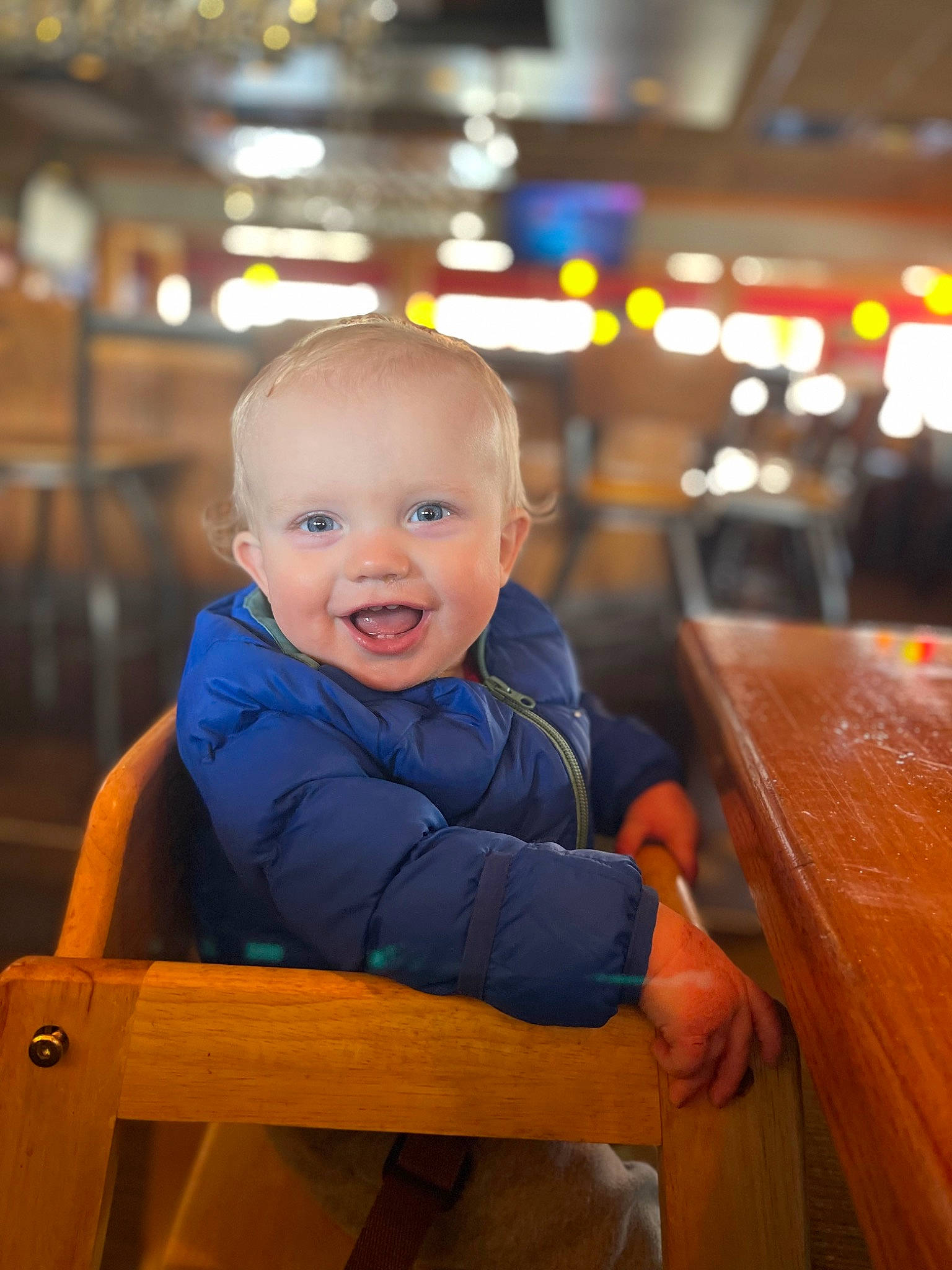 Michael is registered to the contest to win money with this photo: baby, baby_toddler_clothing, chair, chin, city, electric_blue, flash_photography, fun, happy, iris, leisure, orange, person, recreation, sitting, sleeve, smile, standing, table, toddler