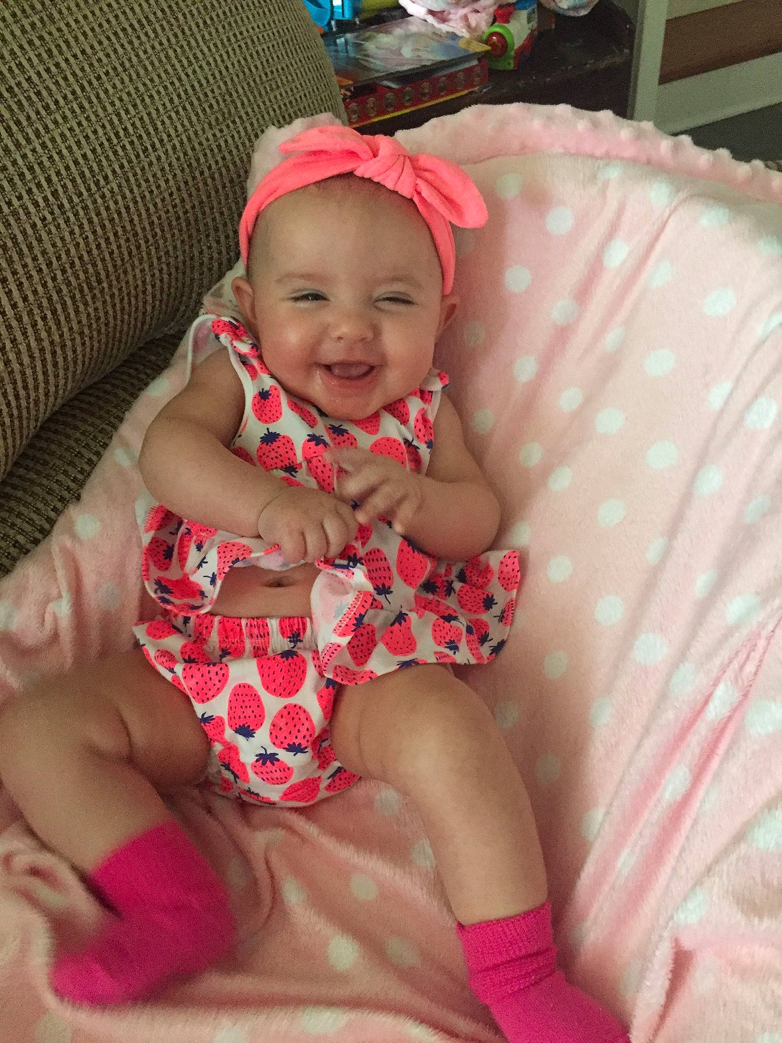 Kya is registered to the contest to win money with this photo: baby, baby_products, baby_toddler_clothing, cheek, child, hair_accessory, headgear, headwear, joy, person, pink, skin, toddler