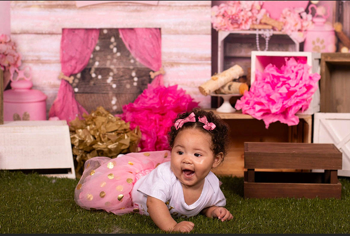 Ariah joined the competition — help win amazing prizes! baby, baby_toddler_clothing, child, event, flooring, flower, grass, happy, lawn, leisure, magenta, person, petal, pink, plant, red, smile, textile, toddler, tree