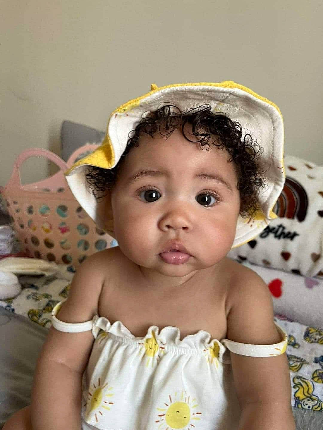 Ariah joined the competition — help win amazing prizes! baby, baby_products, baby_toddler_clothing, cap, cheek, child, costume_hat, embellishment, eyelash, fashion_accessory, hair_accessory, happy, head, headband, headpiece, iris, jewellery, person, skin, smile